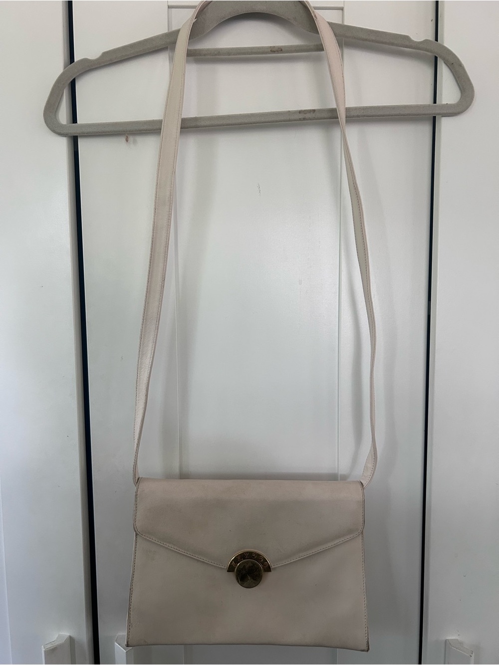 Paloma Picasso Cream Leather Crossbody with Gold-Tone Medallion